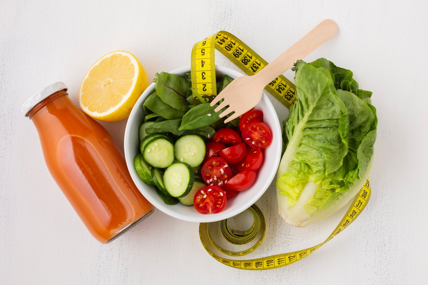 flat-lay-salad-juice-bottle_23-2148262146